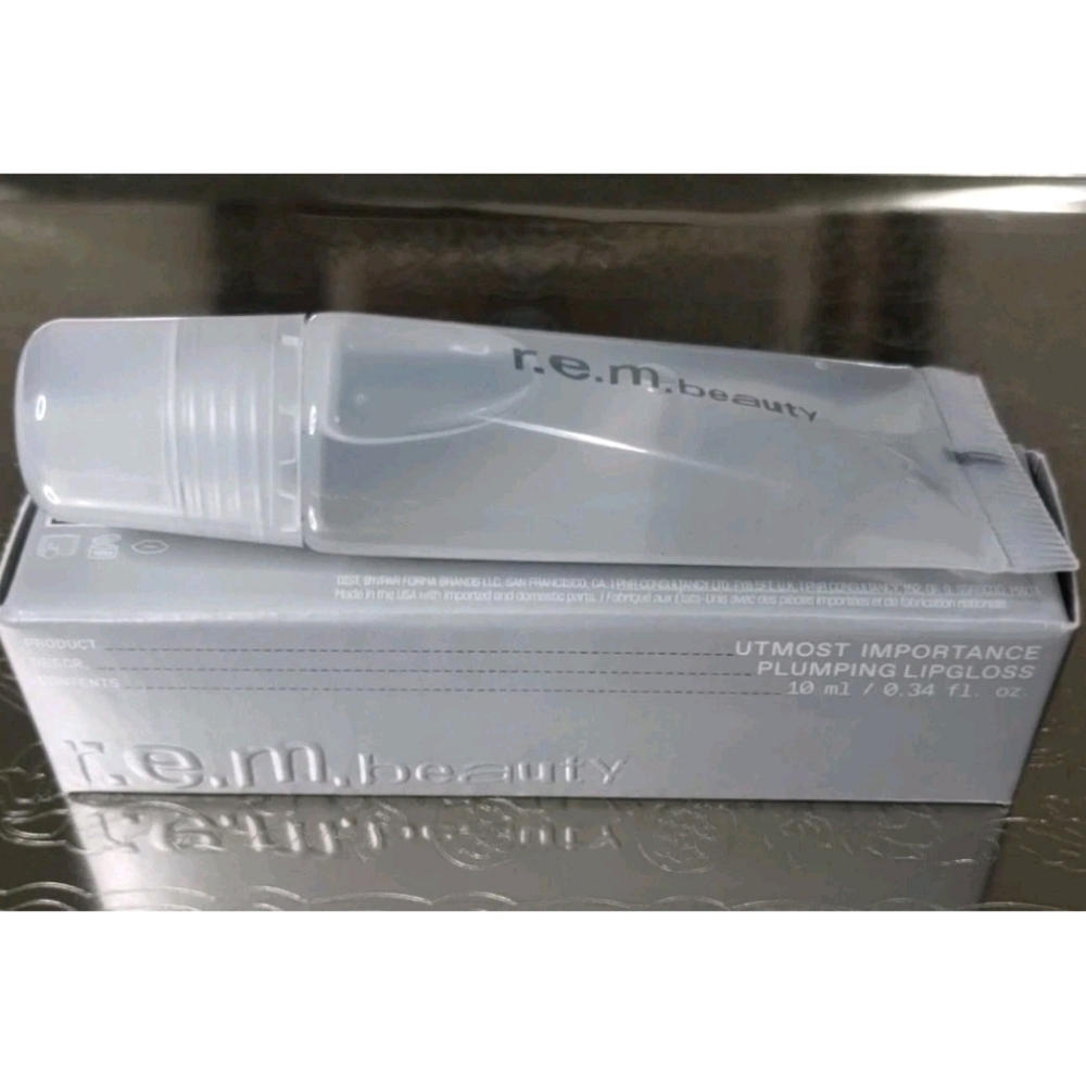 R.E.M Beauty Utmost Importance Plumping Lip Gloss 0.34 OZ.
